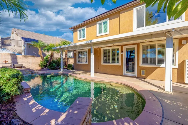 front view of a house with a patio