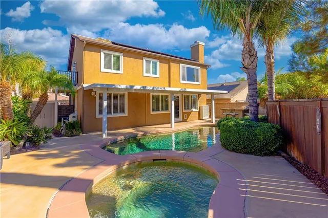 a view of a house with a swimming pool