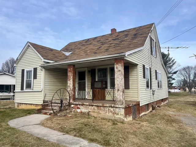 front view of a house with a patio