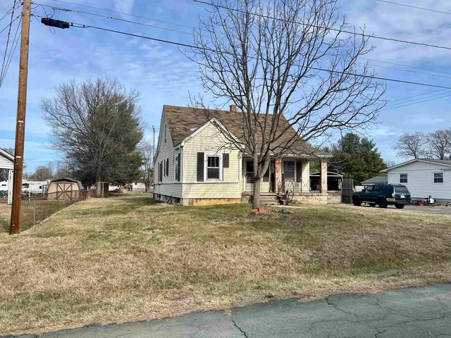 a view of a yard in front of a house