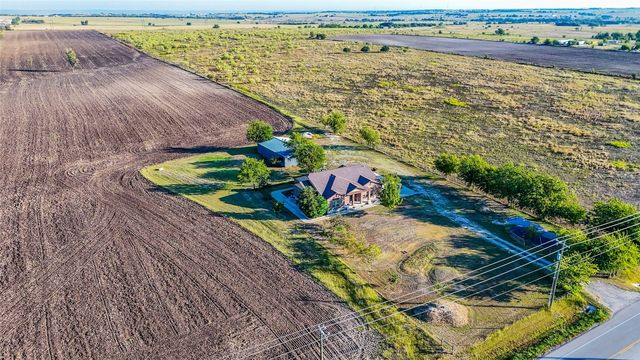 an aerial view of beach and ocean