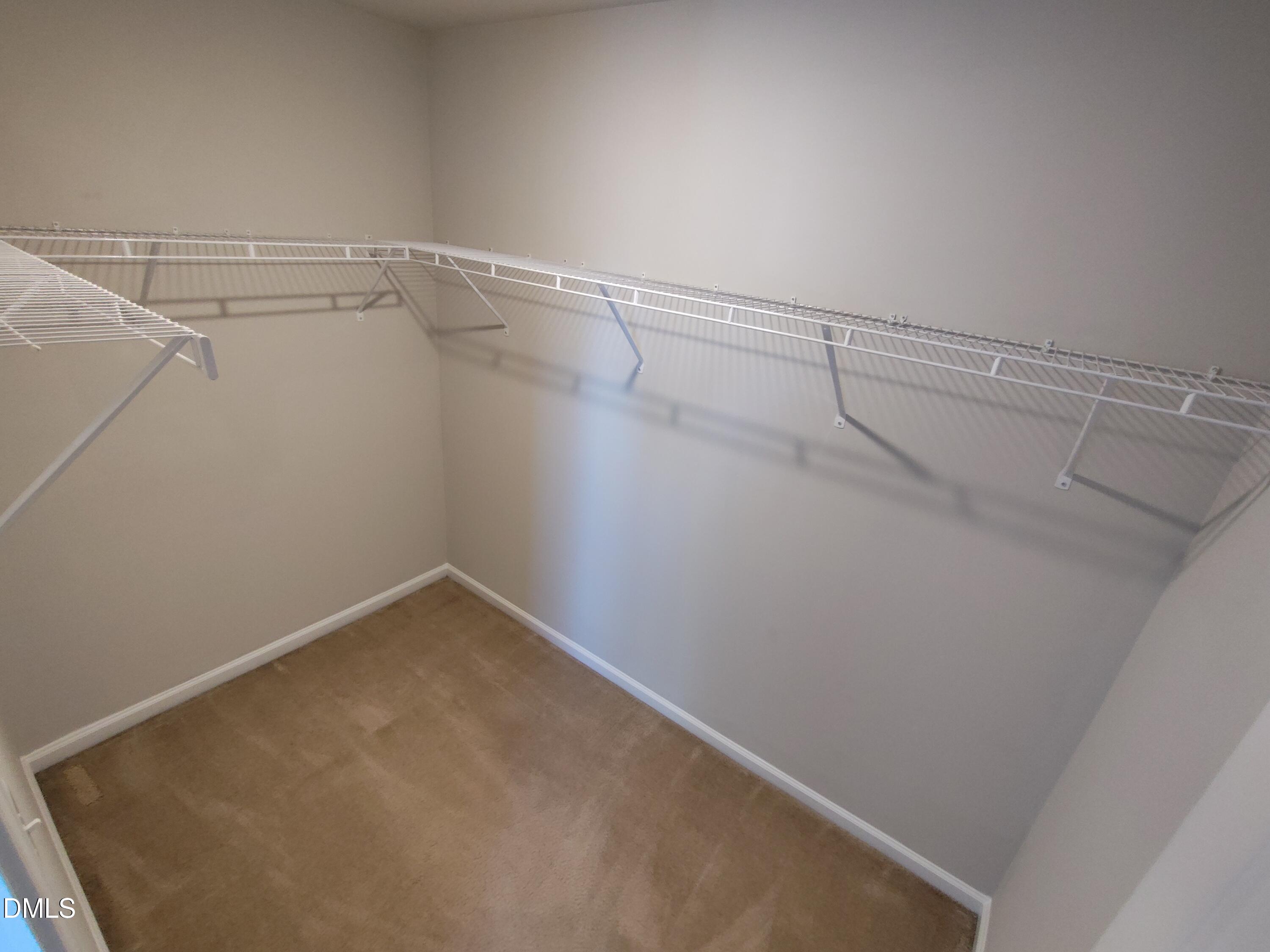 1013 Kudzu Street Durham, NC 27713 - Photo 17 of 21 a view of a room with racks on the wall