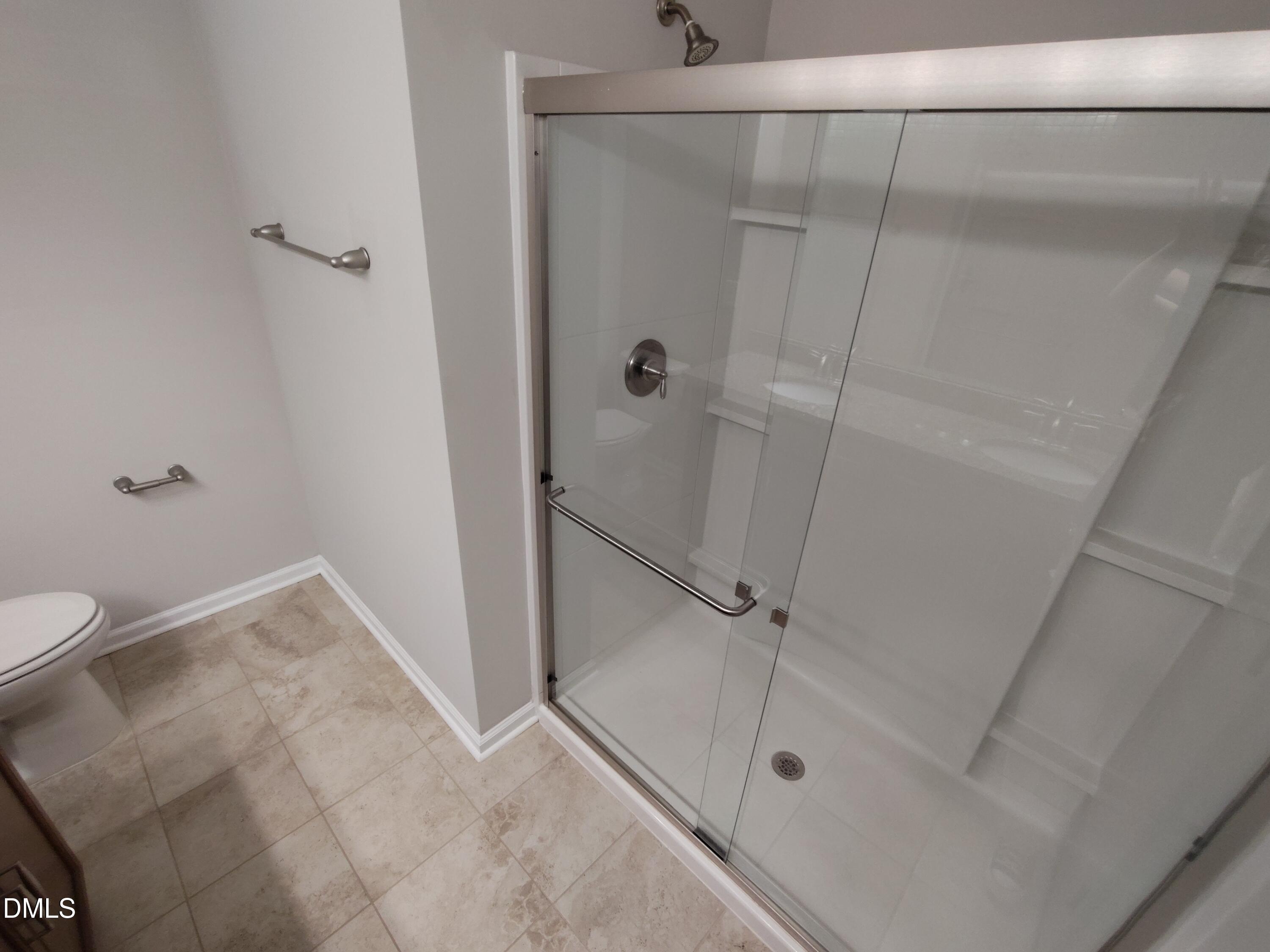 1013 Kudzu Street Durham, NC 27713 - Photo 19 of 21 a bathroom with a shower and toilet