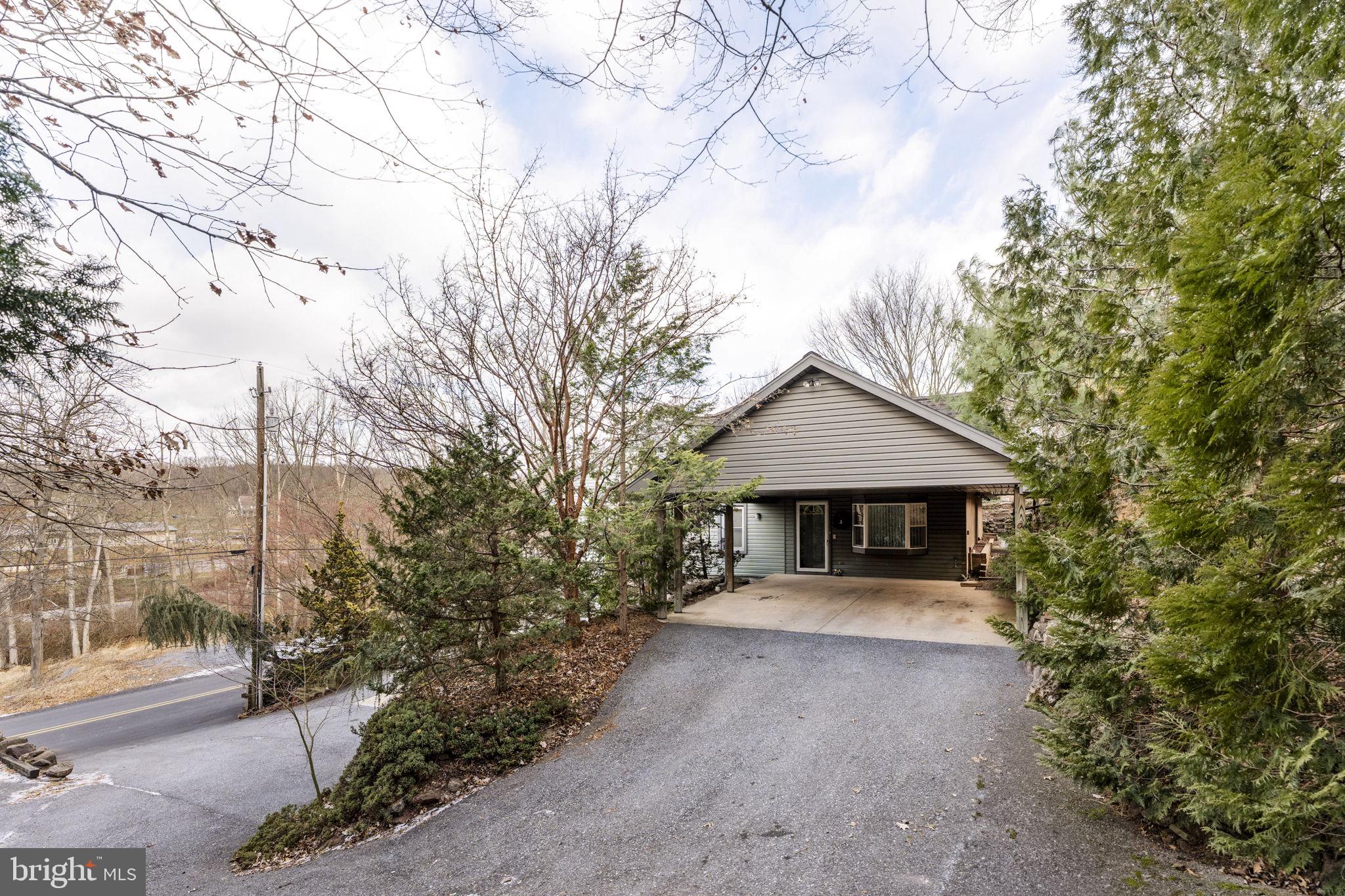 130 Resh Road Reinholds, PA 17569 - Photo 4 of 58 a front view of a house with garden