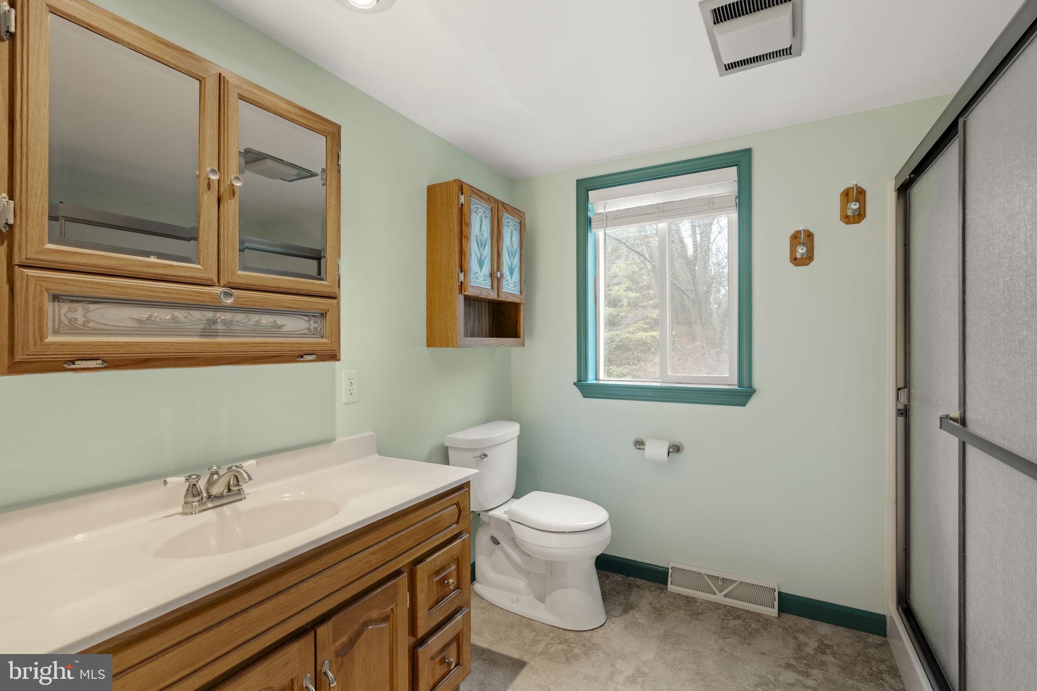 130 Resh Road Reinholds, PA 17569 - Photo 49 of 58 a bathroom with a granite countertop toilet and a sink
