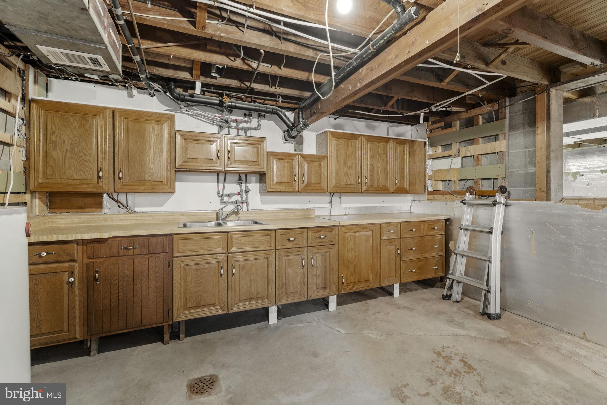 130 Resh Road Reinholds, PA 17569 - Photo 50 of 58 a utility room with cabinets dryer and washer