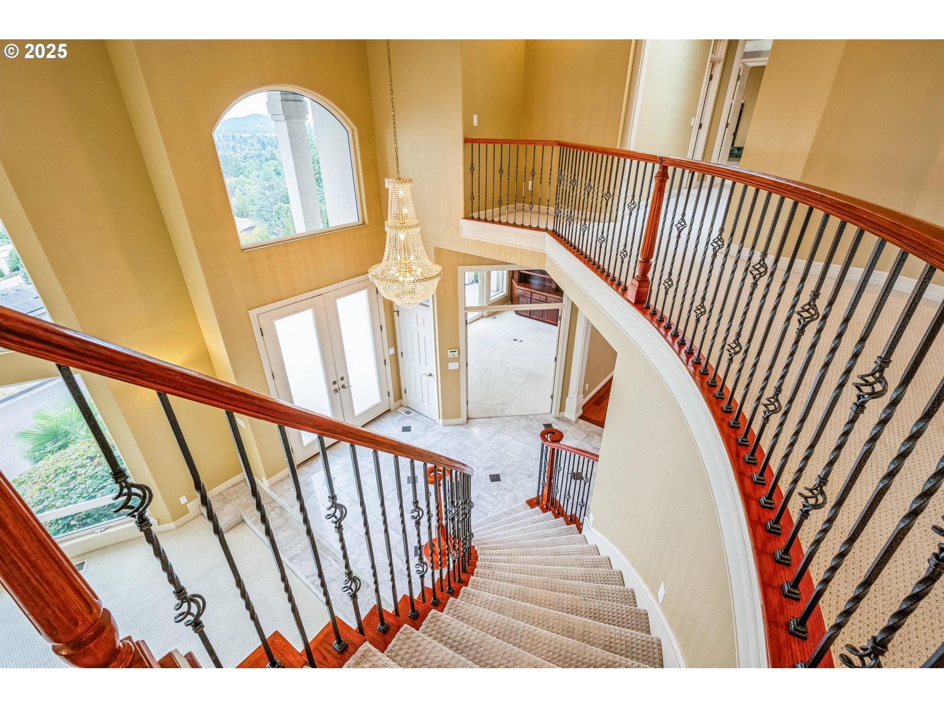 9340 Southeast Emmert View Court Happy Valley, OR 97086 - Photo 14 of 42 a view of staircase with railing and a rug