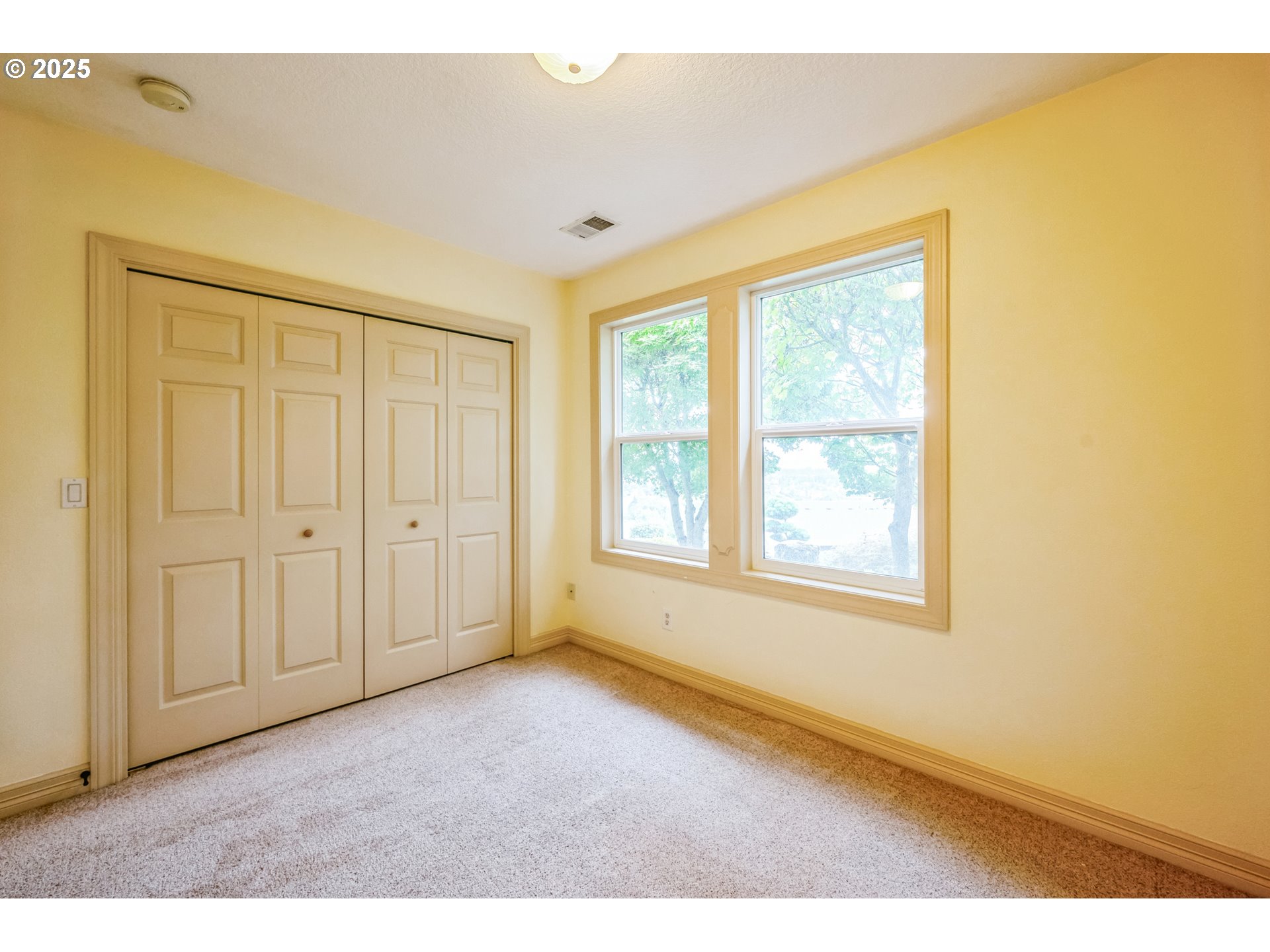 9340 Southeast Emmert View Court Happy Valley, OR 97086 - Photo 42 of 42 a view of an empty room with a window