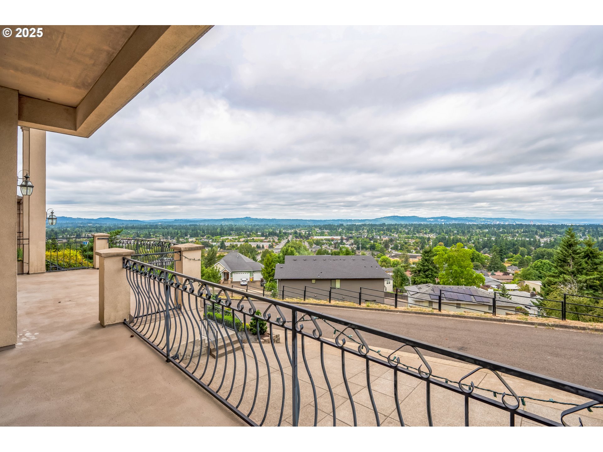 9340 Southeast Emmert View Court Happy Valley, OR 97086 - Photo 5 of 42 a view of city from a balcony