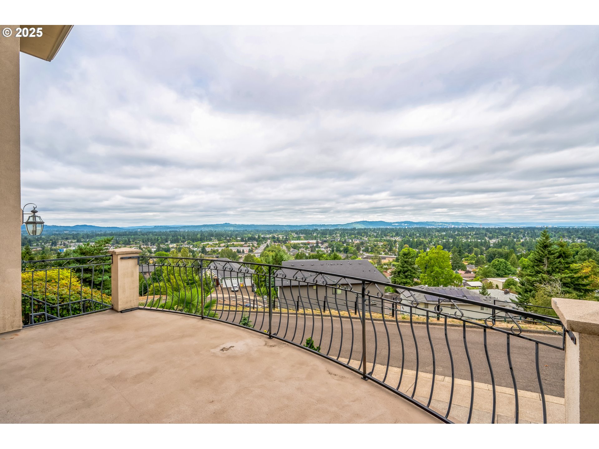 9340 Southeast Emmert View Court Happy Valley, OR 97086 - Photo 6 of 42 a balcony with an ocean view