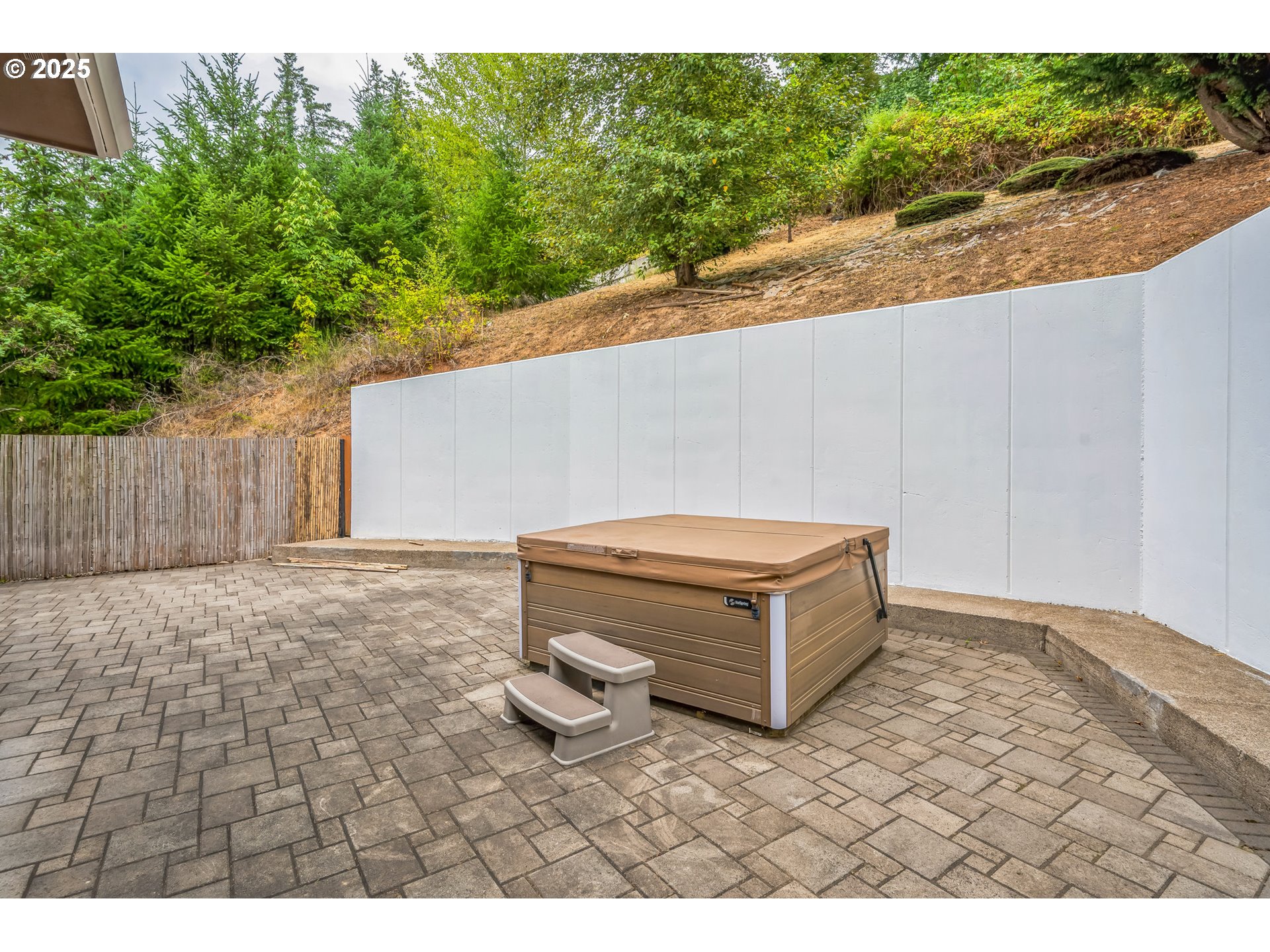 9340 Southeast Emmert View Court Happy Valley, OR 97086 - Photo 7 of 42 a backyard of a house with a yard and outdoor seating