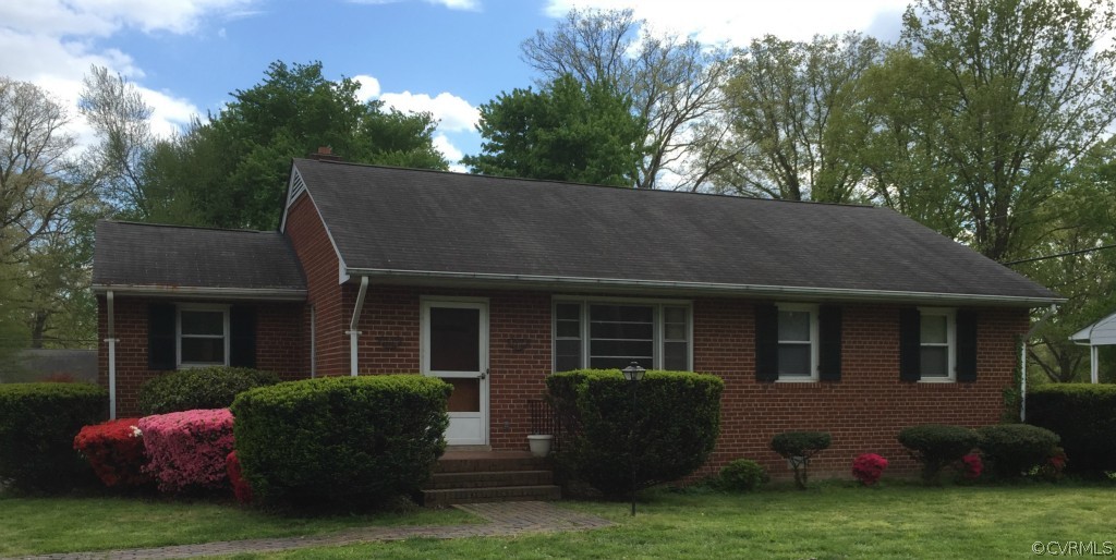303 Wilkinson Road Richmond, VA 23227 - Photo 1 of 1 a house view with a garden space
