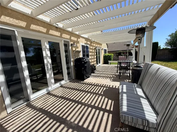 a view of a porch with furniture