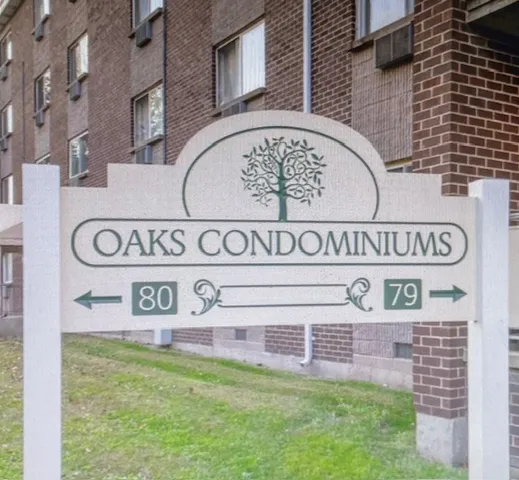 a sign that is on a brick wall