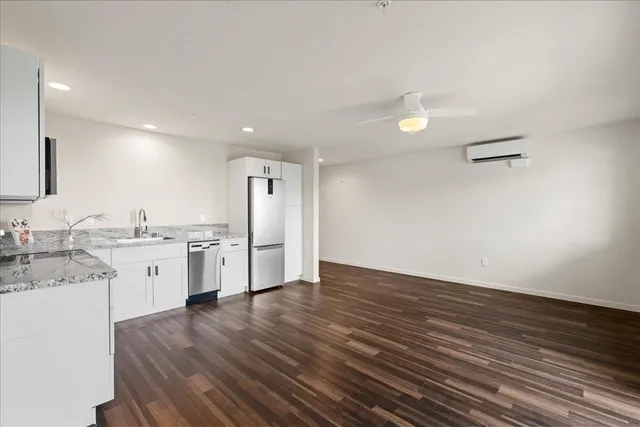 a view of kitchen with wooden floor