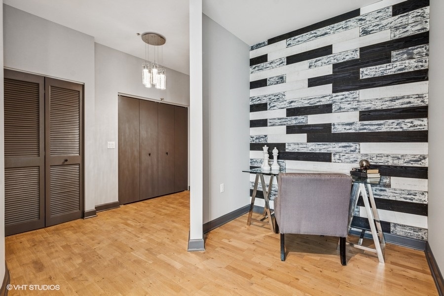 1235 South Prairie Avenue, Unit 3605 Chicago, IL 60605 - Photo 12 of 34 a workspace with furniture and wooden floor
