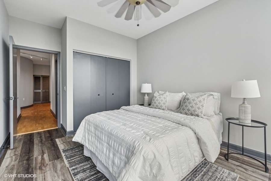 1235 South Prairie Avenue, Unit 3605 Chicago, IL 60605 - Photo 20 of 34 a bedroom with a bed and a walk in closet