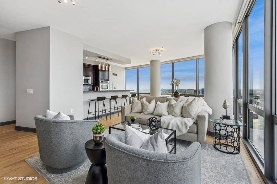 1235 South Prairie Avenue, Unit 3605 Chicago, IL 60605 - Photo 4 of 34 a living room with furniture kitchen and a window