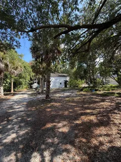 a house view with a backyard space