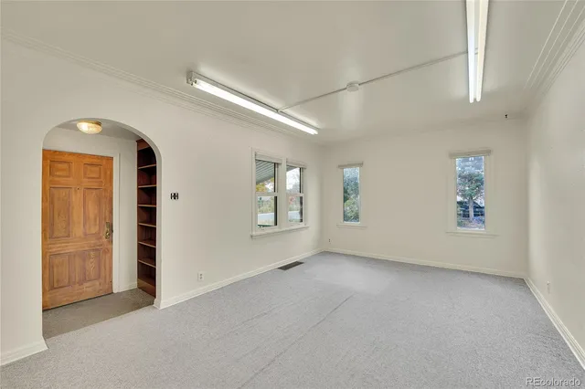 an empty room with windows