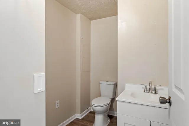 a bathroom with a sink and a toilet