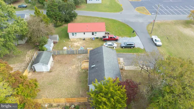 an aerial view of residential houses with city view and lake view