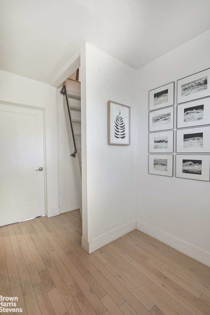 4601 Henry Hudson Parkway West, Unit A7 Bronx, NY 10471 - Photo 21 of 24 a view of an empty room with empty racks