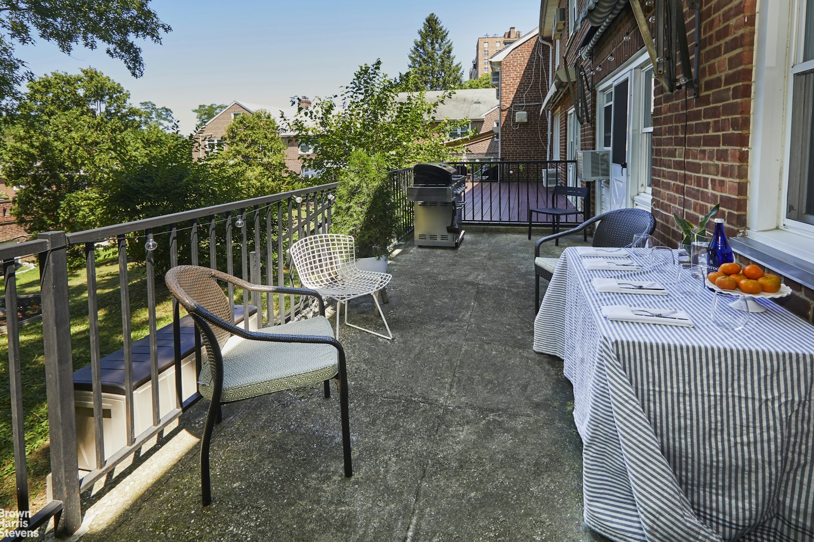 4601 Henry Hudson Parkway West, Unit A7 Bronx, NY 10471 - Photo 5 of 24 a view of a chairs and table in the deck