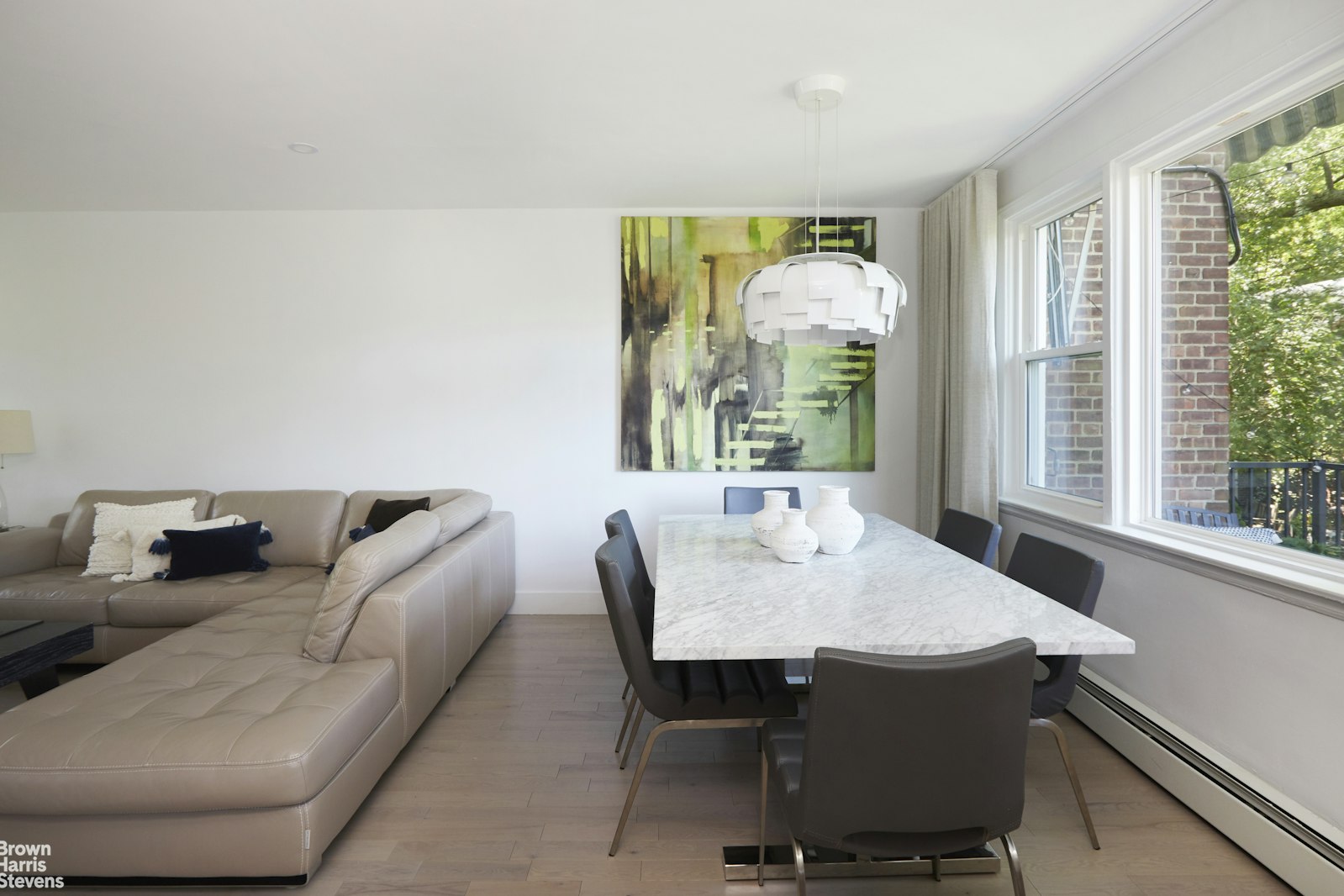 4601 Henry Hudson Parkway West, Unit A7 Bronx, NY 10471 - Photo 7 of 24 a living room with furniture and window