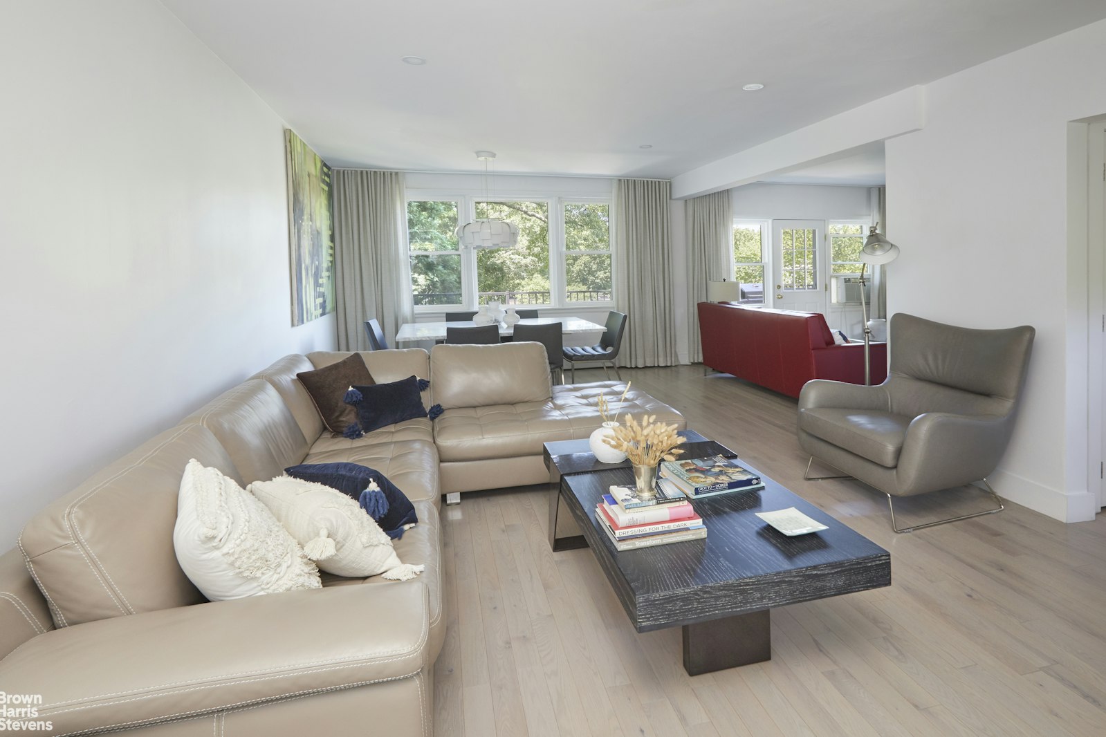 4601 Henry Hudson Parkway West, Unit A7 Bronx, NY 10471 - Photo 9 of 24 a living room with furniture and a large window