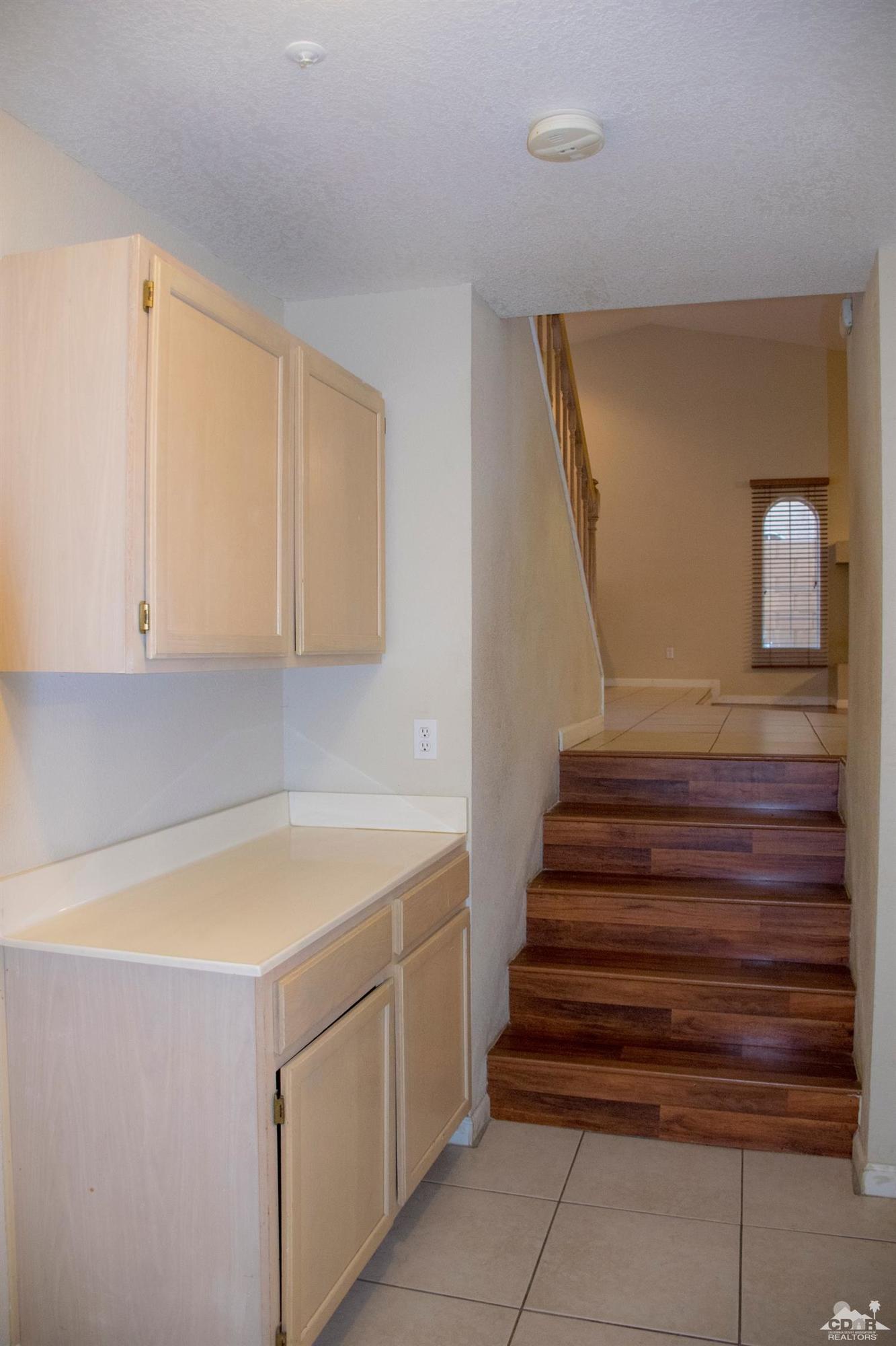 68340 Tortuga Road Cathedral City, CA 92234 - Photo 14 of 37 a utility room with cabinets