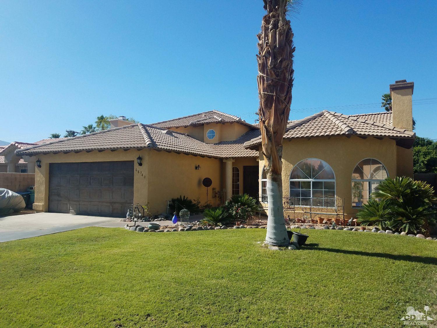 68340 Tortuga Road Cathedral City, CA 92234 - Photo 2 of 37 a front view of house with yard