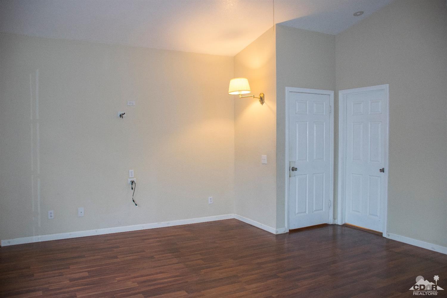 68340 Tortuga Road Cathedral City, CA 92234 - Photo 24 of 37 a view of a room with wooden floor