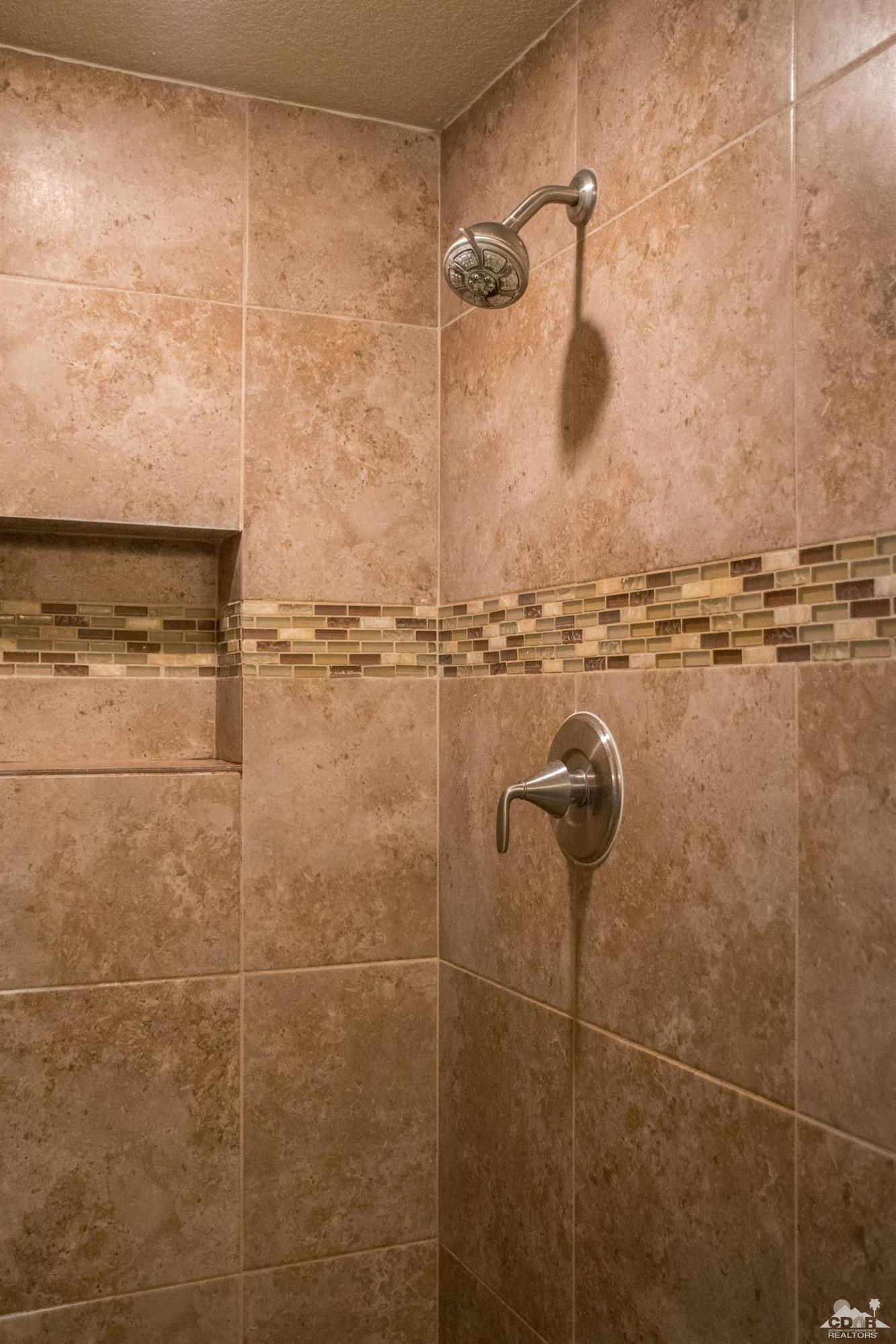 68340 Tortuga Road Cathedral City, CA 92234 - Photo 29 of 37 a bathroom with a shower