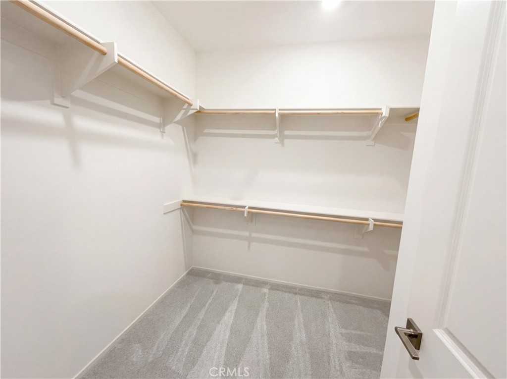 5628 Kate Way, Unit 3 Fontana, CA 92336 - Photo 18 of 20 a view of an empty walk in closet