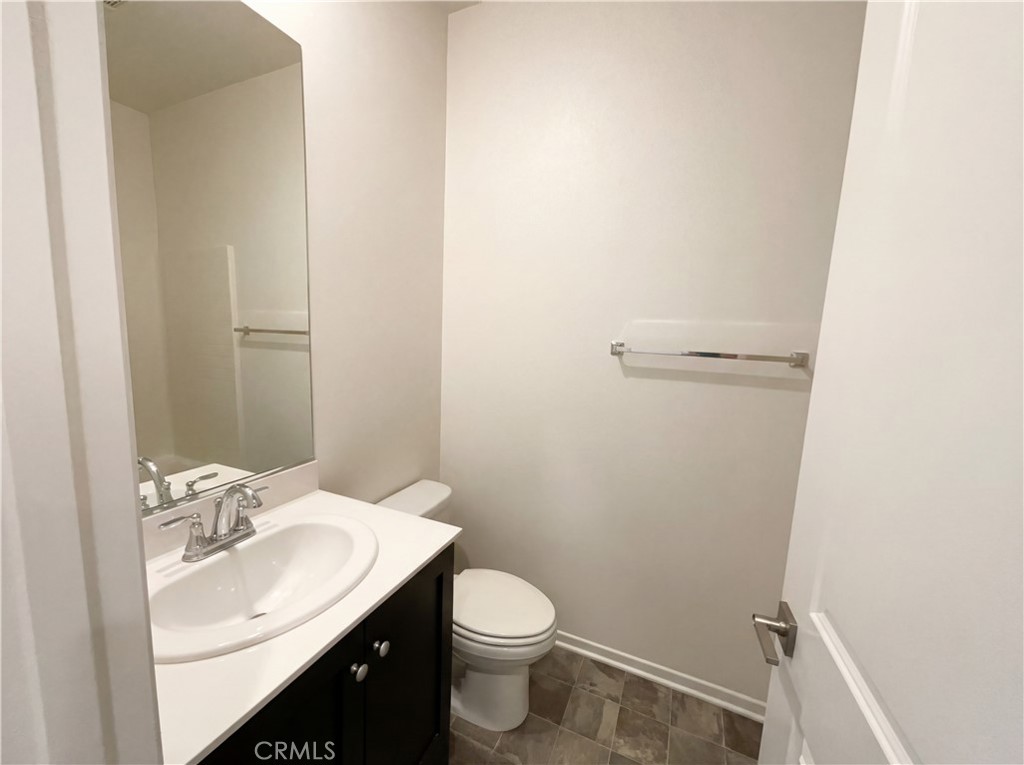5628 Kate Way, Unit 3 Fontana, CA 92336 - Photo 10 of 20 a bathroom with a sink and a toilet