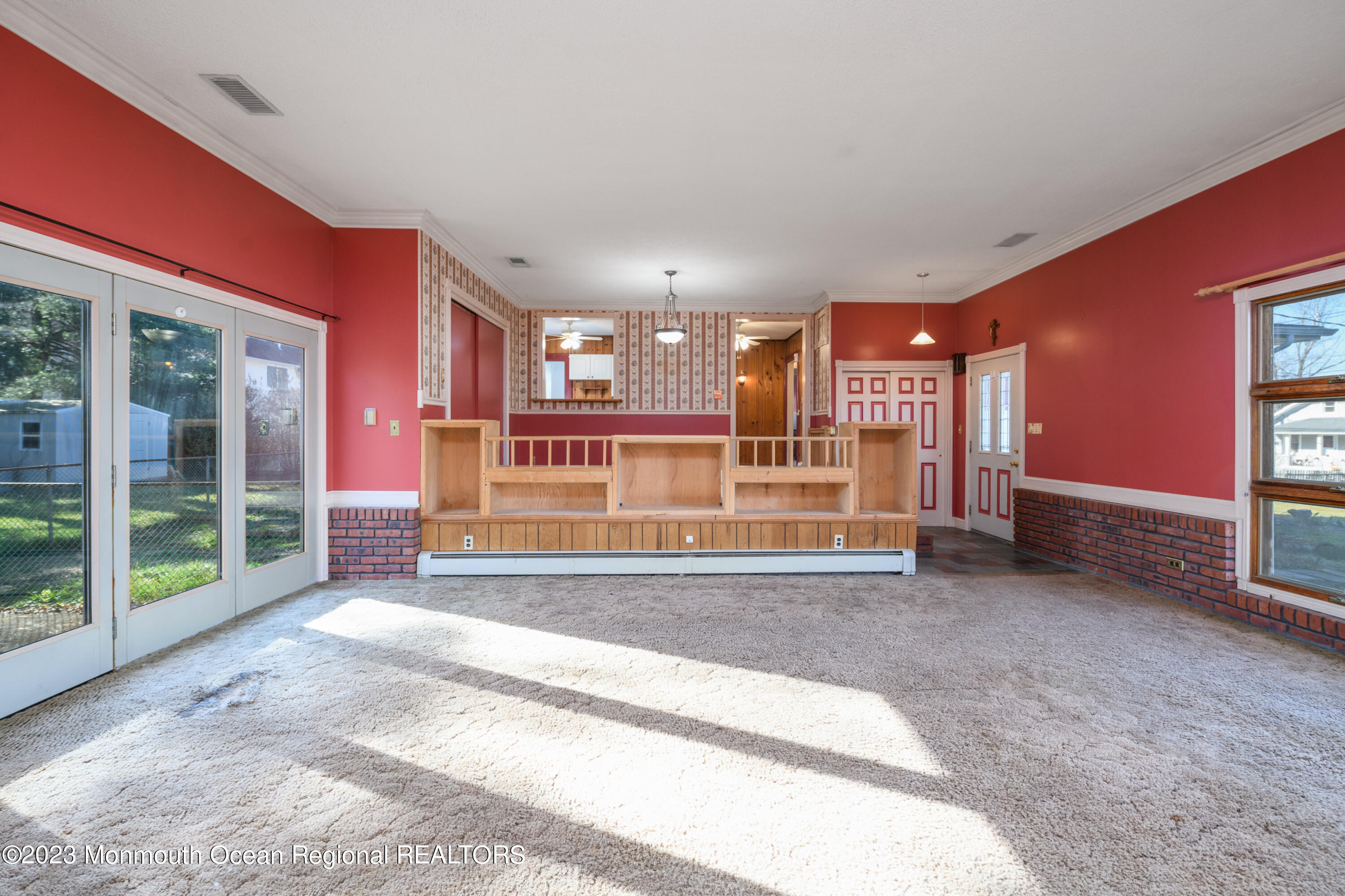 13 Texas Road Matawan, NJ 07747 - Photo 17 of 33 a view of a room with a large window and chandelier