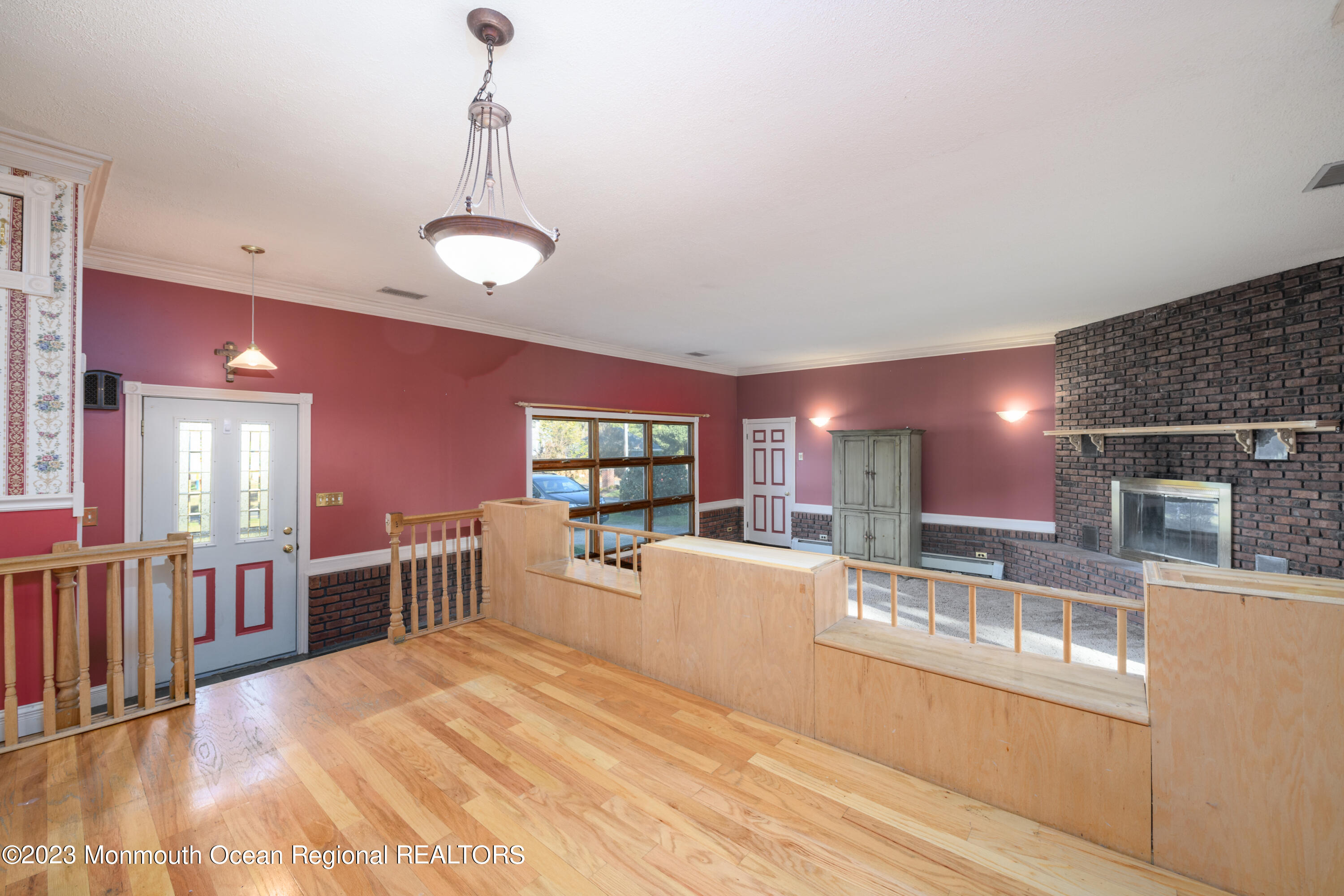 13 Texas Road Matawan, NJ 07747 - Photo 19 of 33 a view of a kitchen with kitchen island a large counter space a sink appliances and living room view