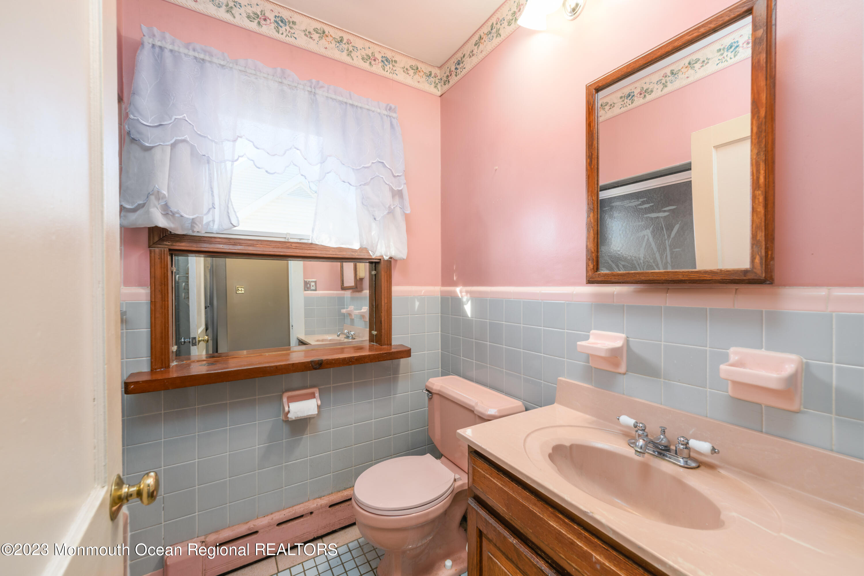 13 Texas Road Matawan, NJ 07747 - Photo 29 of 33 a bathroom with a sink vanity mirror and toilet