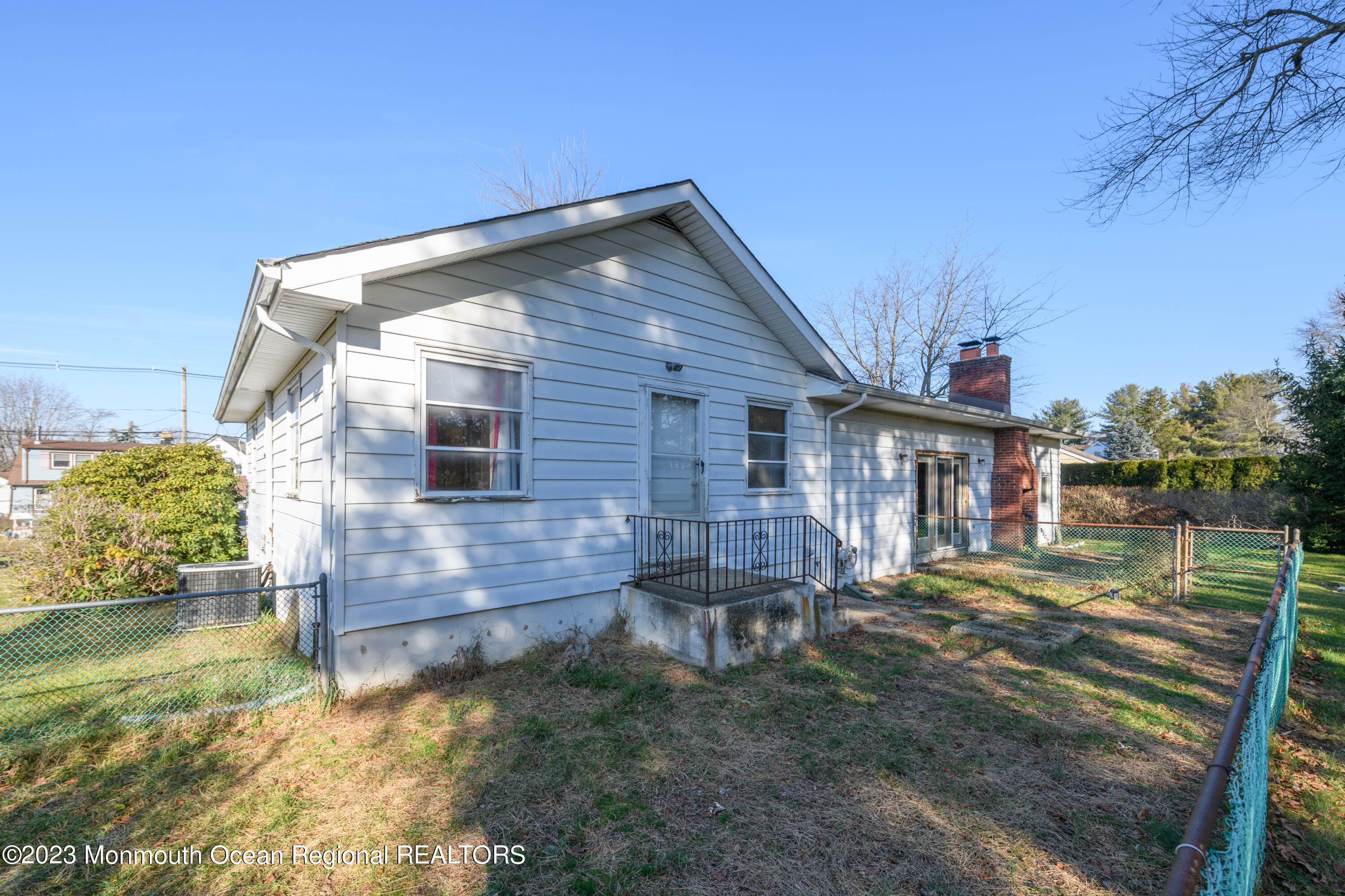 13 Texas Road Matawan, NJ 07747 - Photo 7 of 33 a backyard of a house with table and chairs