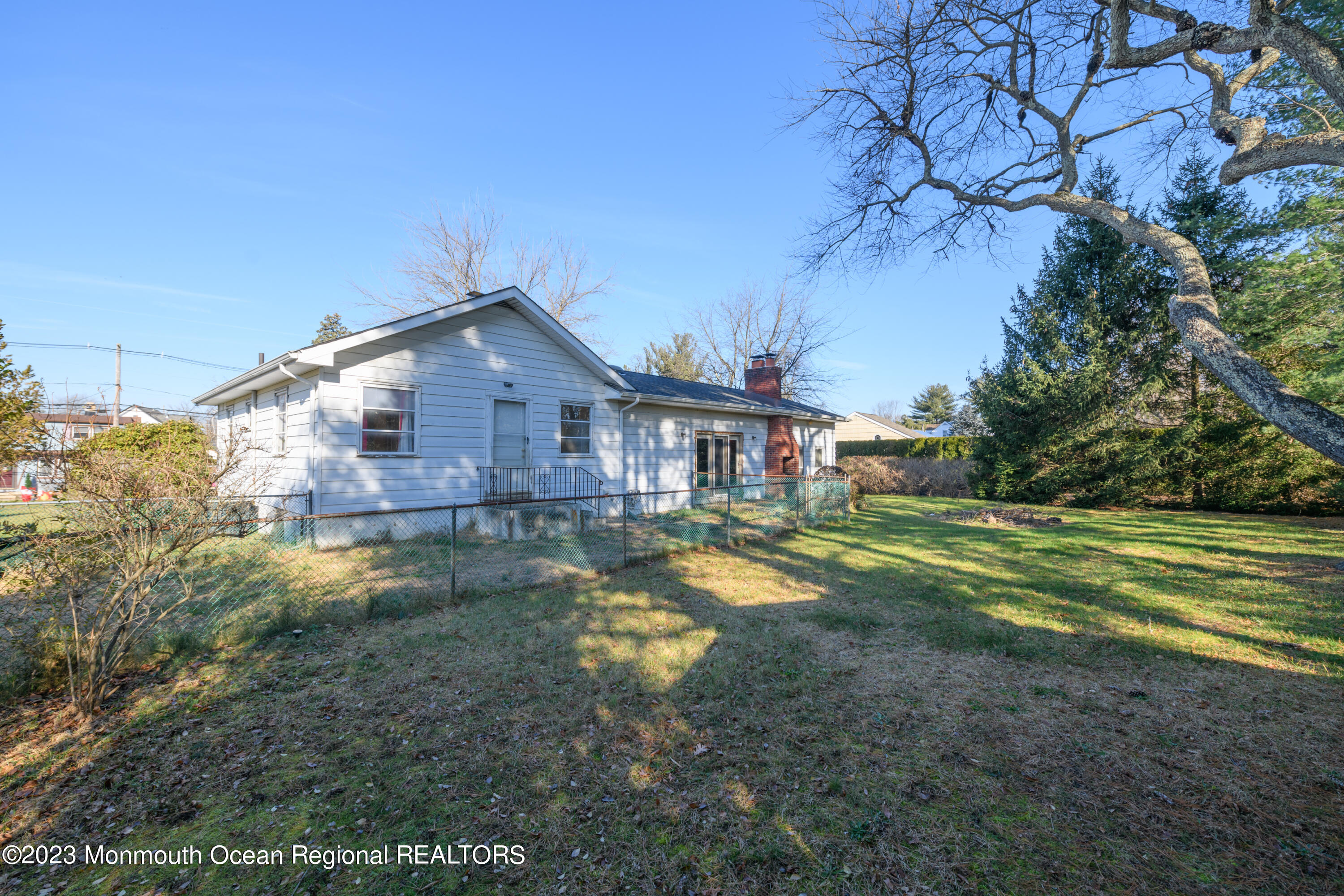 13 Texas Road Matawan, NJ 07747 - Photo 8 of 33 a front view of a house with a yard