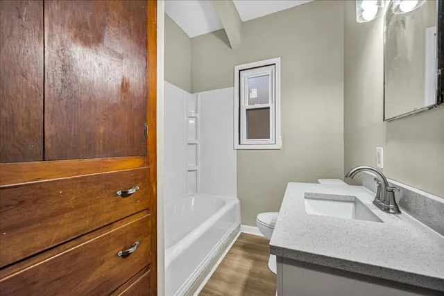 a bathroom with a sink and a bathtub