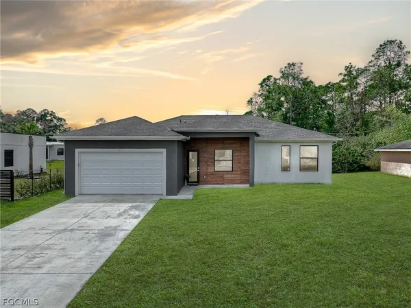 $299,000 | 133 Greenbriar Boulevard, Lehigh Acres, FL 33972
