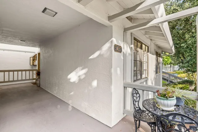 a view of a porch with furniture
