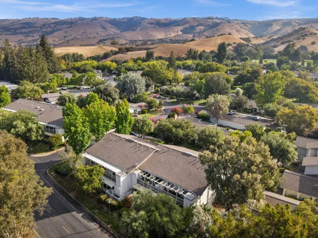 an aerial view of residential house and outdoor space