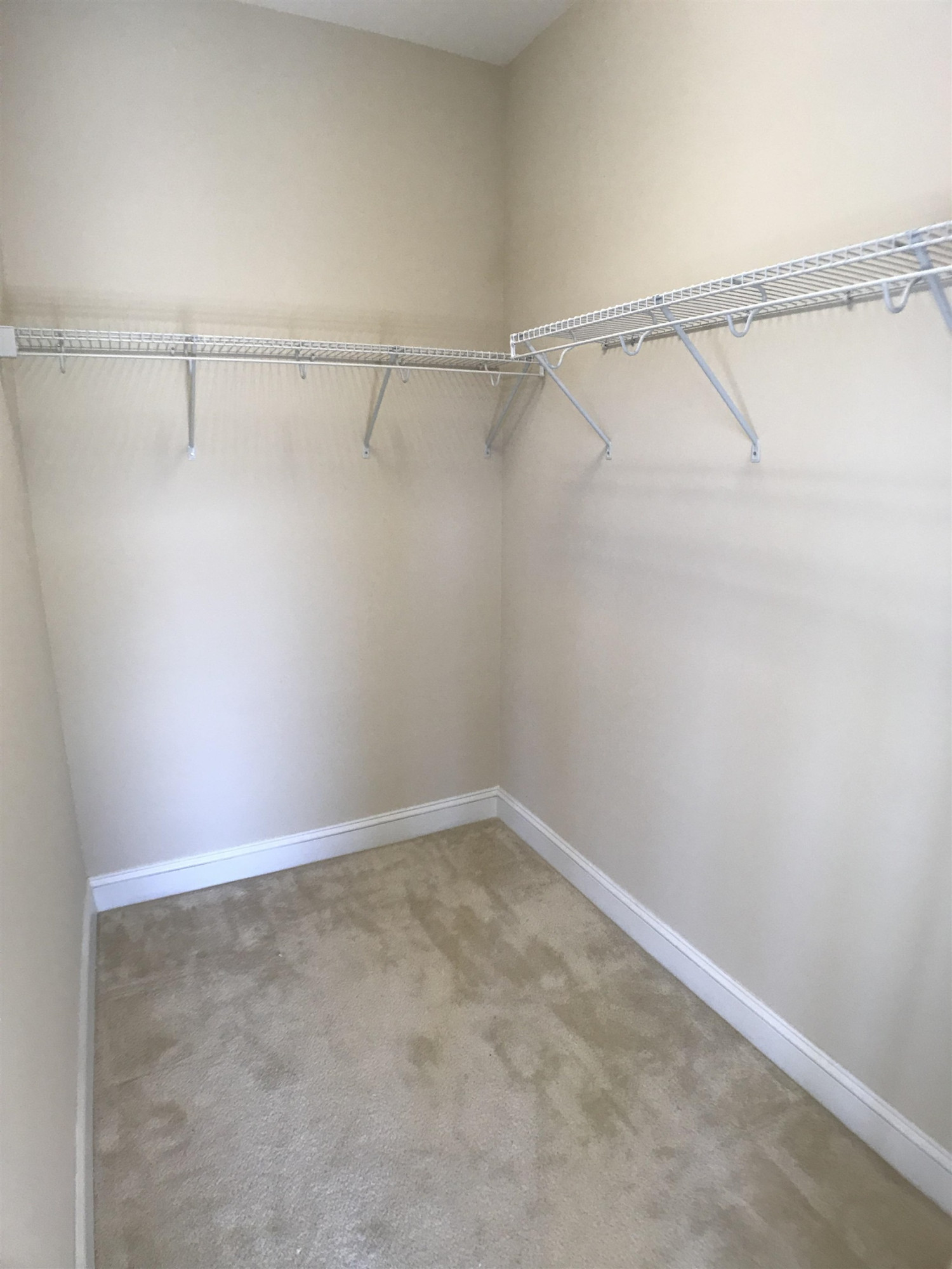 925 Rosepine Drive Cary, NC 27519 - Photo 14 of 21 a view of a room with racks on the wall