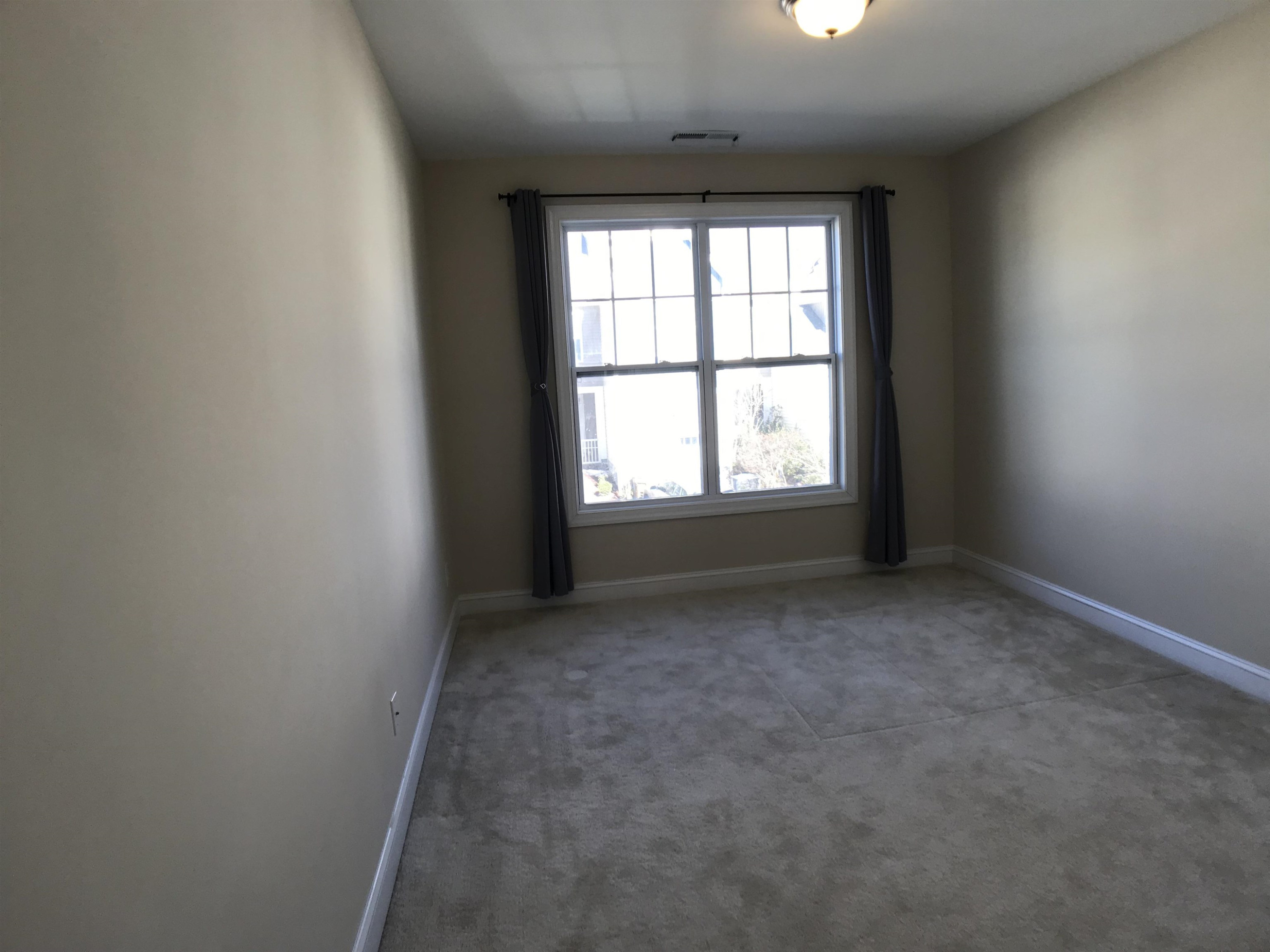 925 Rosepine Drive Cary, NC 27519 - Photo 15 of 21 an empty room with a window