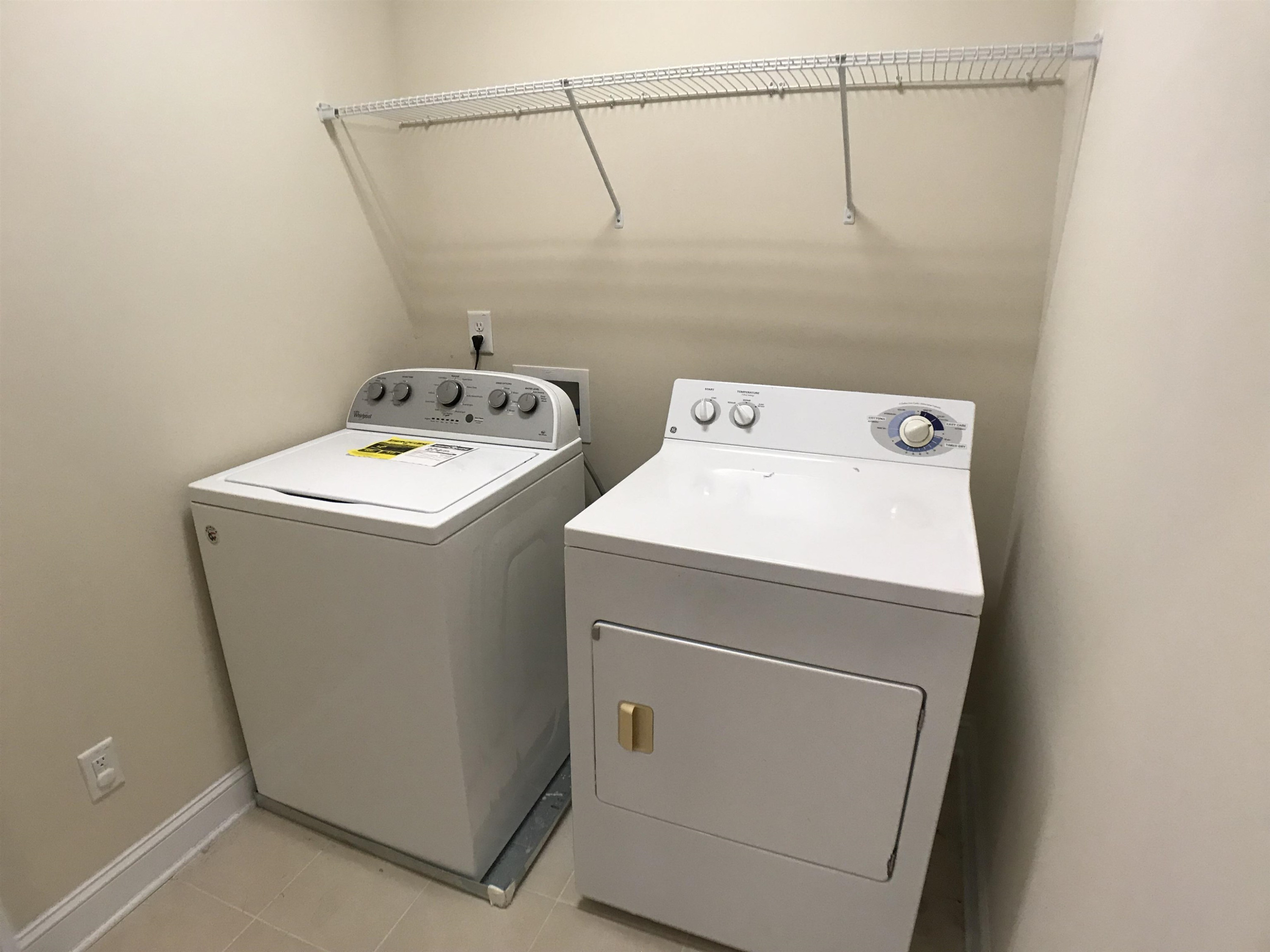 925 Rosepine Drive Cary, NC 27519 - Photo 18 of 21 a utility room with dryer and washer