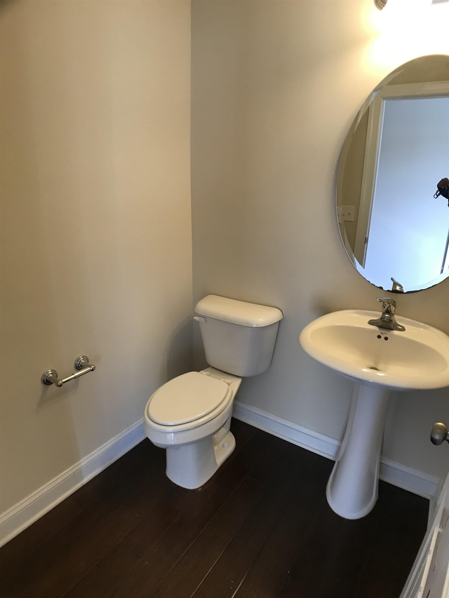 925 Rosepine Drive Cary, NC 27519 - Photo 8 of 21 a bathroom with a toilet a sink and mirror