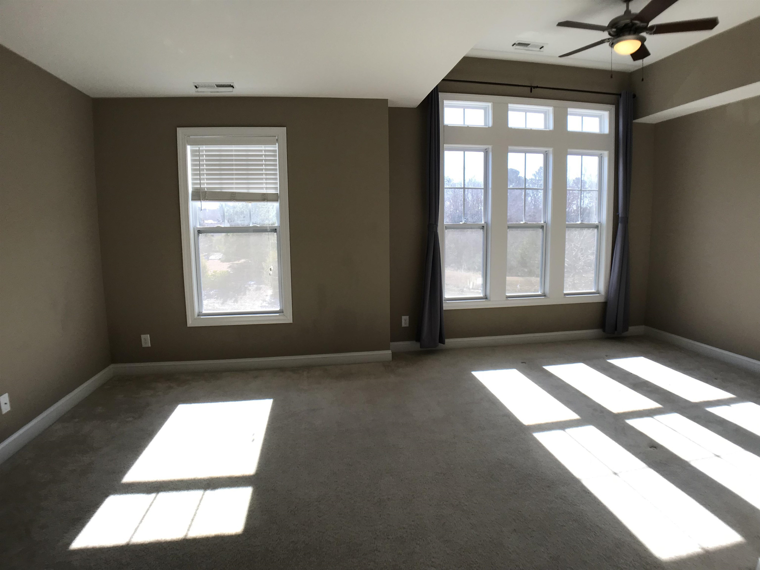 925 Rosepine Drive Cary, NC 27519 - Photo 9 of 21 an empty room with a window